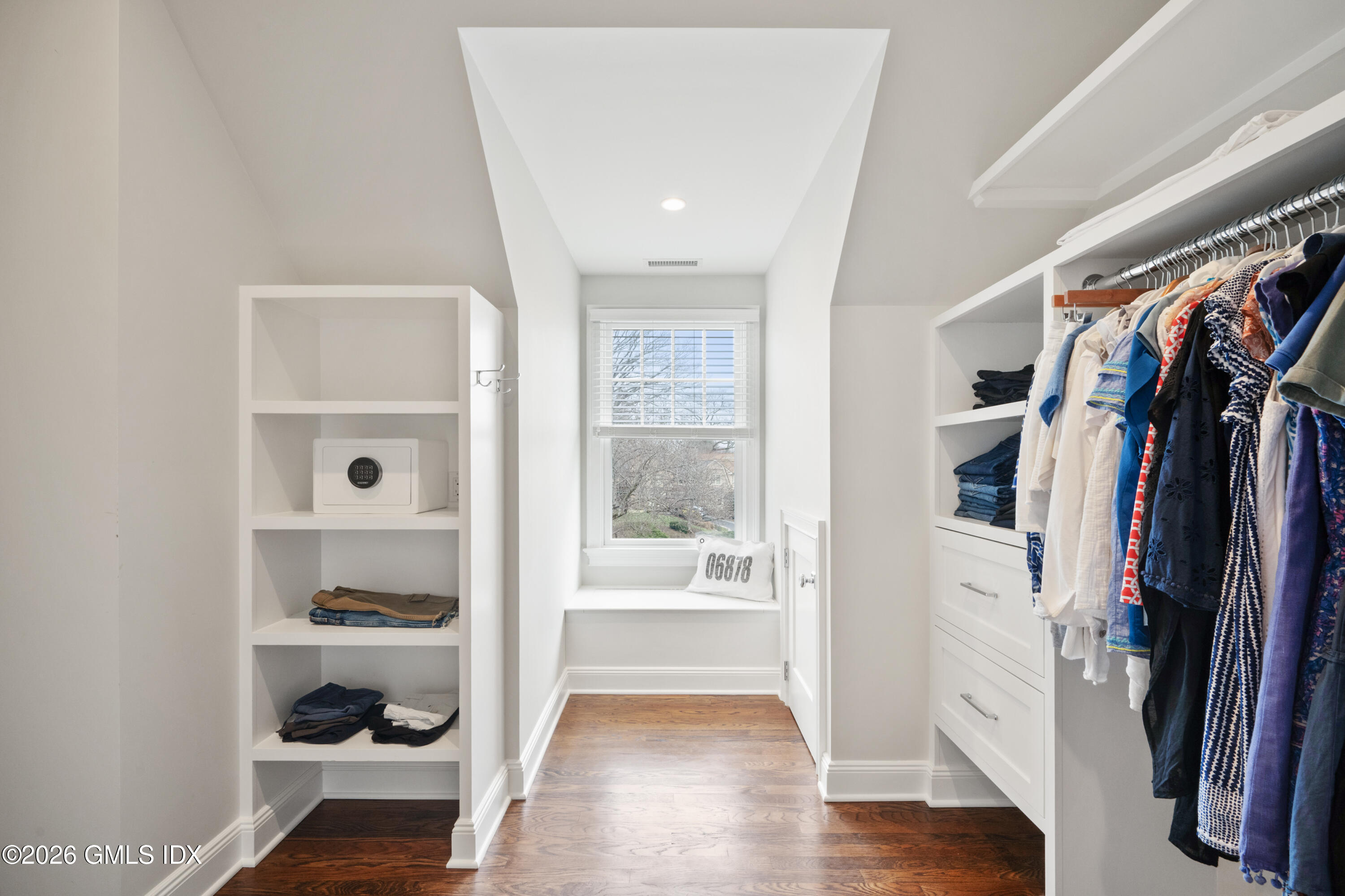 15 Pell Place Riverside, CT 06878 - Photo 21 of 35 a view of walk in closet with clothes and shoes