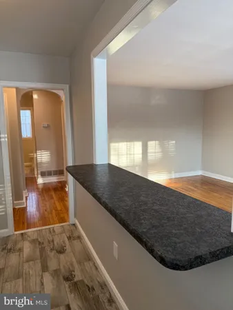 a view of a living room and bathroom