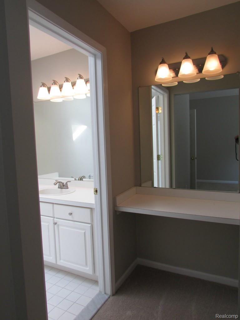 46 Eagle Ridge Road Lake Orion, MI 48360 - Photo 24 of 35 Awesome second vanity area with mirror and brand new lighting