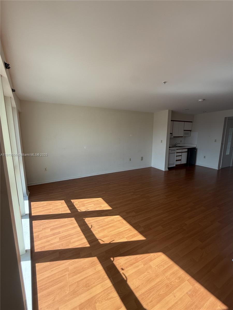 5703 Southwest 72nd Street, Unit 5777 South Miami, FL 33143 - Photo 2 of 6 a view of an empty room