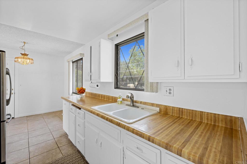 8109 Arlette Street Santee, CA 92071 - Photo 13 of 29 a room with a sink and a window