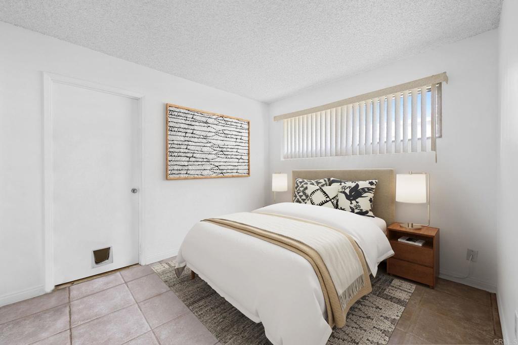 8109 Arlette Street Santee, CA 92071 - Photo 19 of 29 a bedroom with a bed and a window