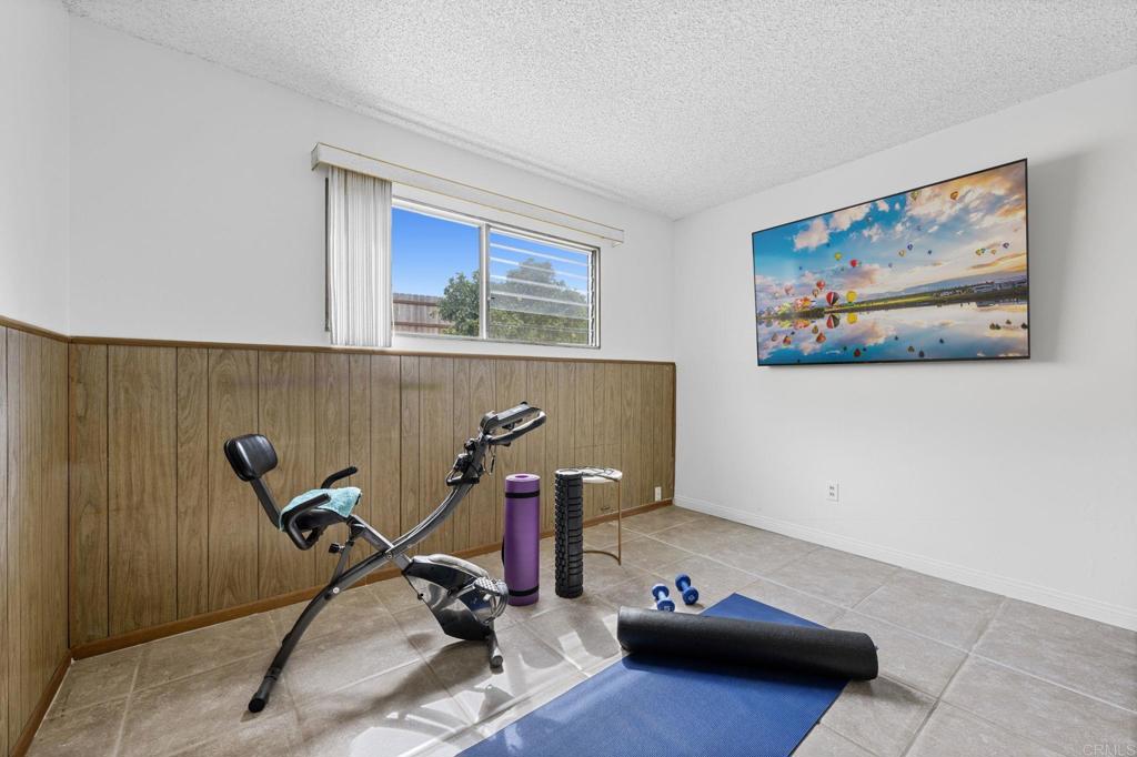 8109 Arlette Street Santee, CA 92071 - Photo 22 of 29 a living room with furniture and a air conditioner vent