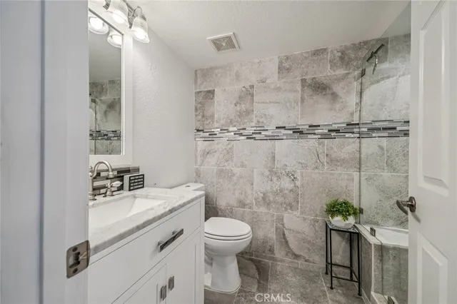 a view of front door and wooden floor
