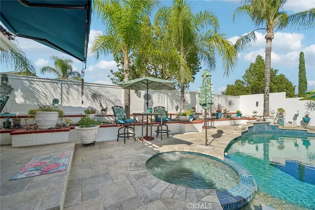a view of living room filled with furniture and furniture