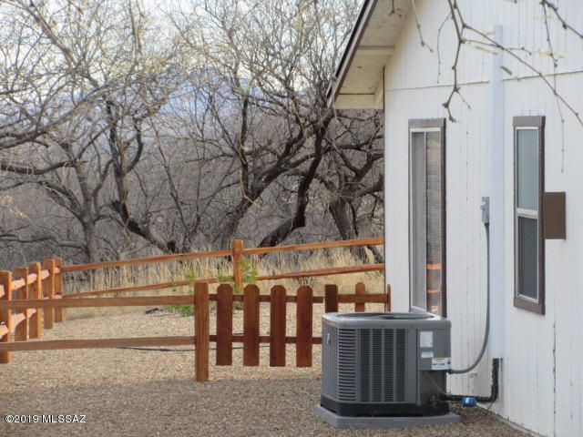 1022 Via Independencia Rio Rico, AZ 85648 - Photo 3 of 41 a view of porch with a table and chairs