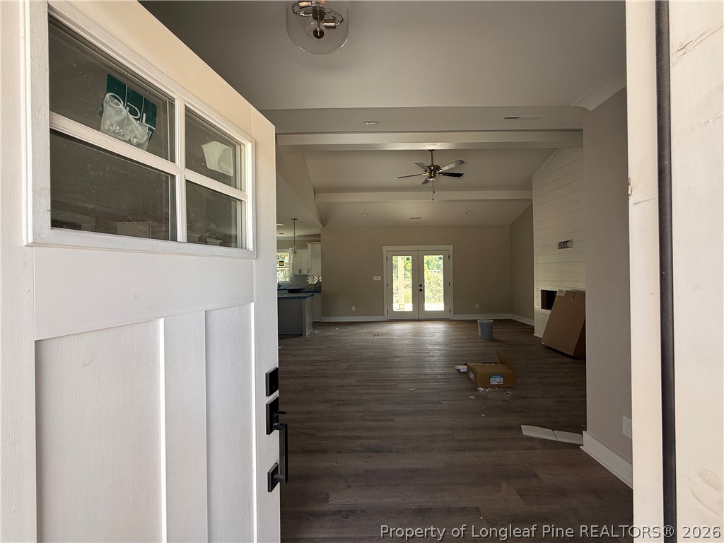 132 Ridge Stone Drive Autryville, NC 28318 - Photo 2 of 26 a view of livingroom with hardwood floor and a ceiling fan