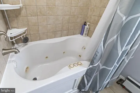 a bathroom with a bathtub