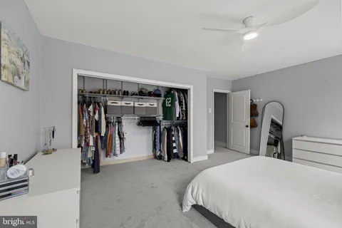 a bed room with a bed and gym equipment