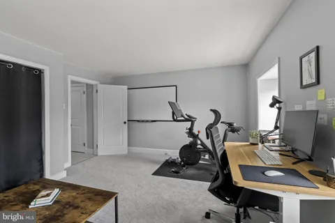 a view of workspace with gym equipment