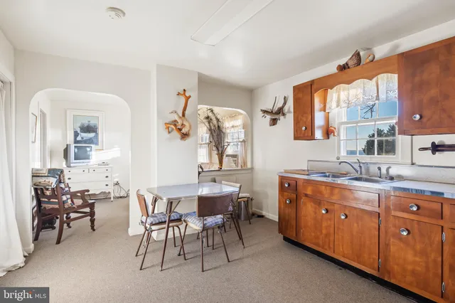 a room with bed and window