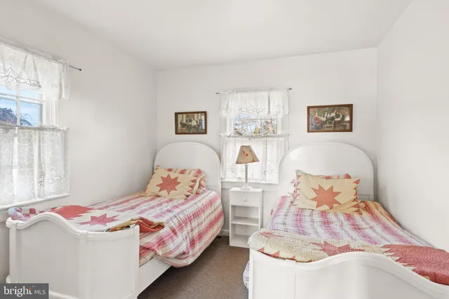 a bedroom with a bed and a cabinets