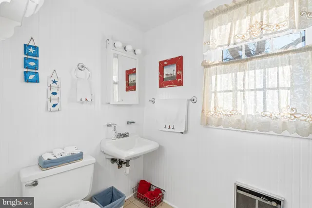 a view of a yard with cars parked