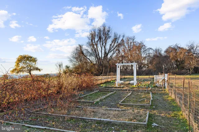 a view of an ocean beach and city