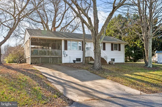 a lake view with a wooden bridge