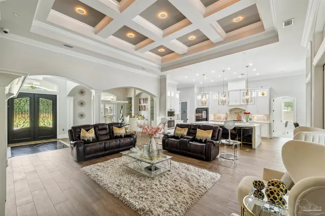 a kitchen with stainless steel appliances granite countertop a stove and a sink