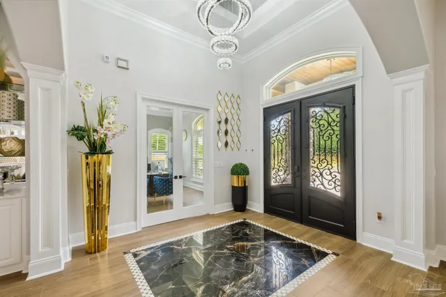 a living room with furniture ceiling fan and a rug