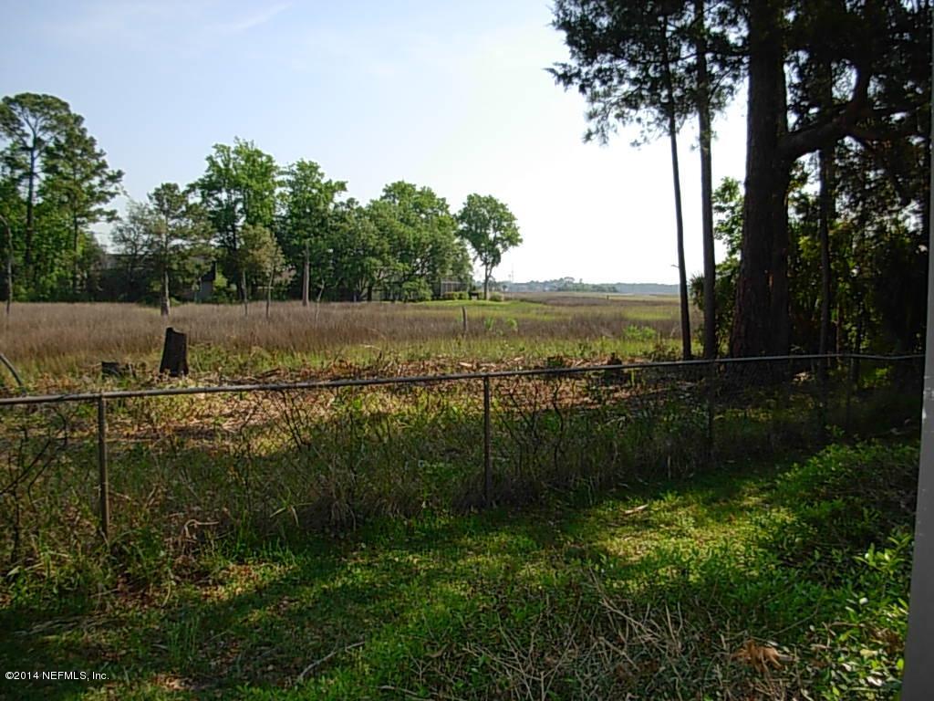 14545 Stacey Road Jacksonville, FL 32250 - Photo 3 of 12 a view of lake with green space