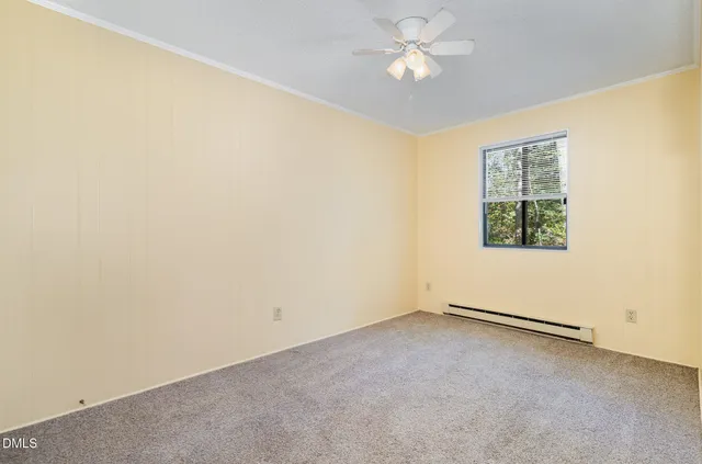 a bathroom with a sink toilet and a mirror