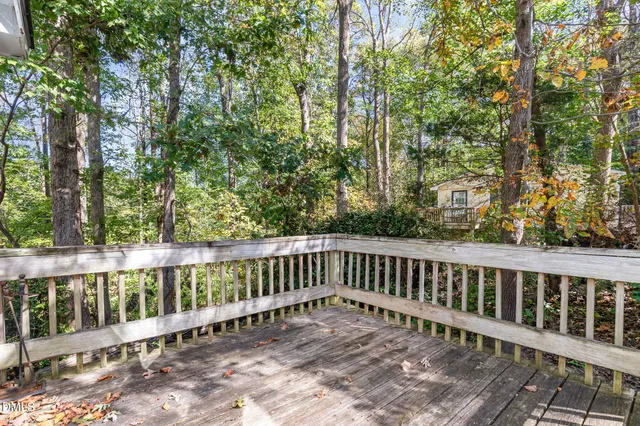 a backyard of a house with yard and barbeque oven