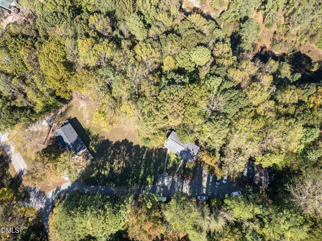 a view of a yard with trees