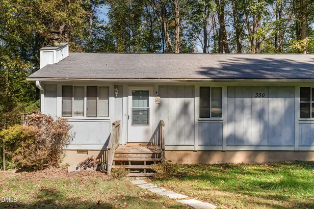 a view of house with outdoor space