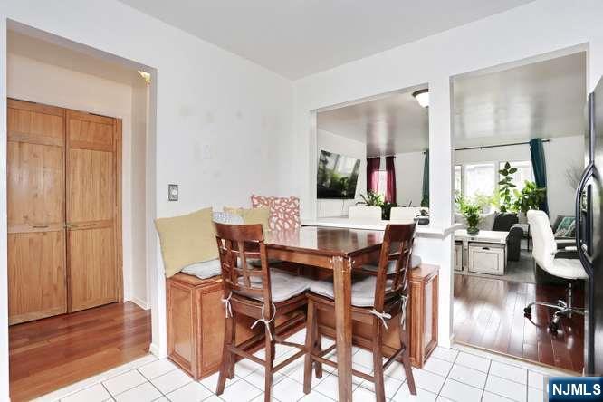 290 Hamilton Place, Unit 4 Hackensack, NJ 07601 - Photo 14 of 50 a view of a dining room with furniture and wooden floor