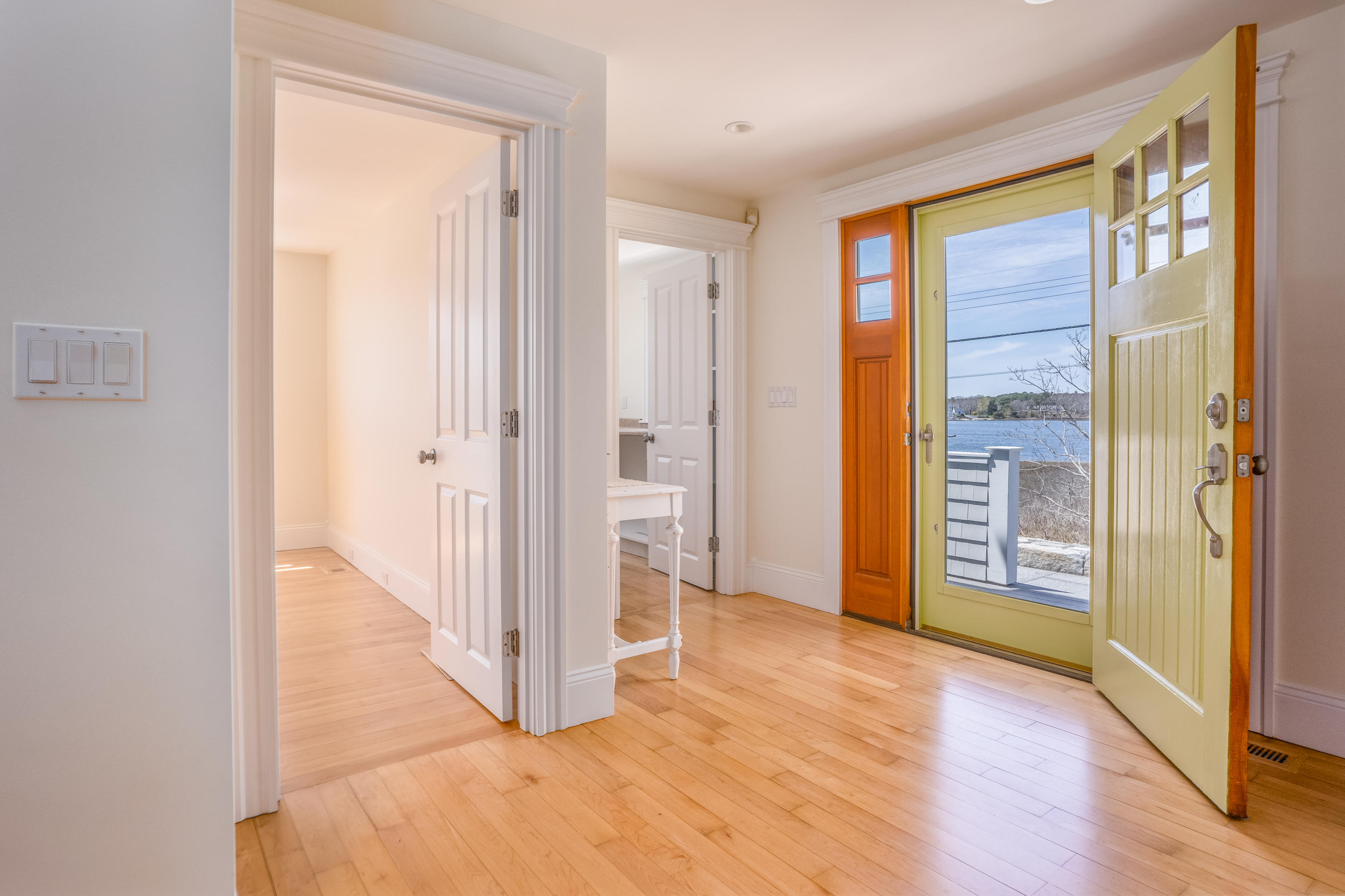 266 Monomoscoy Road Mashpee, MA 02649 - Photo 5 of 35 a view of a hallway with wooden floor and closet area