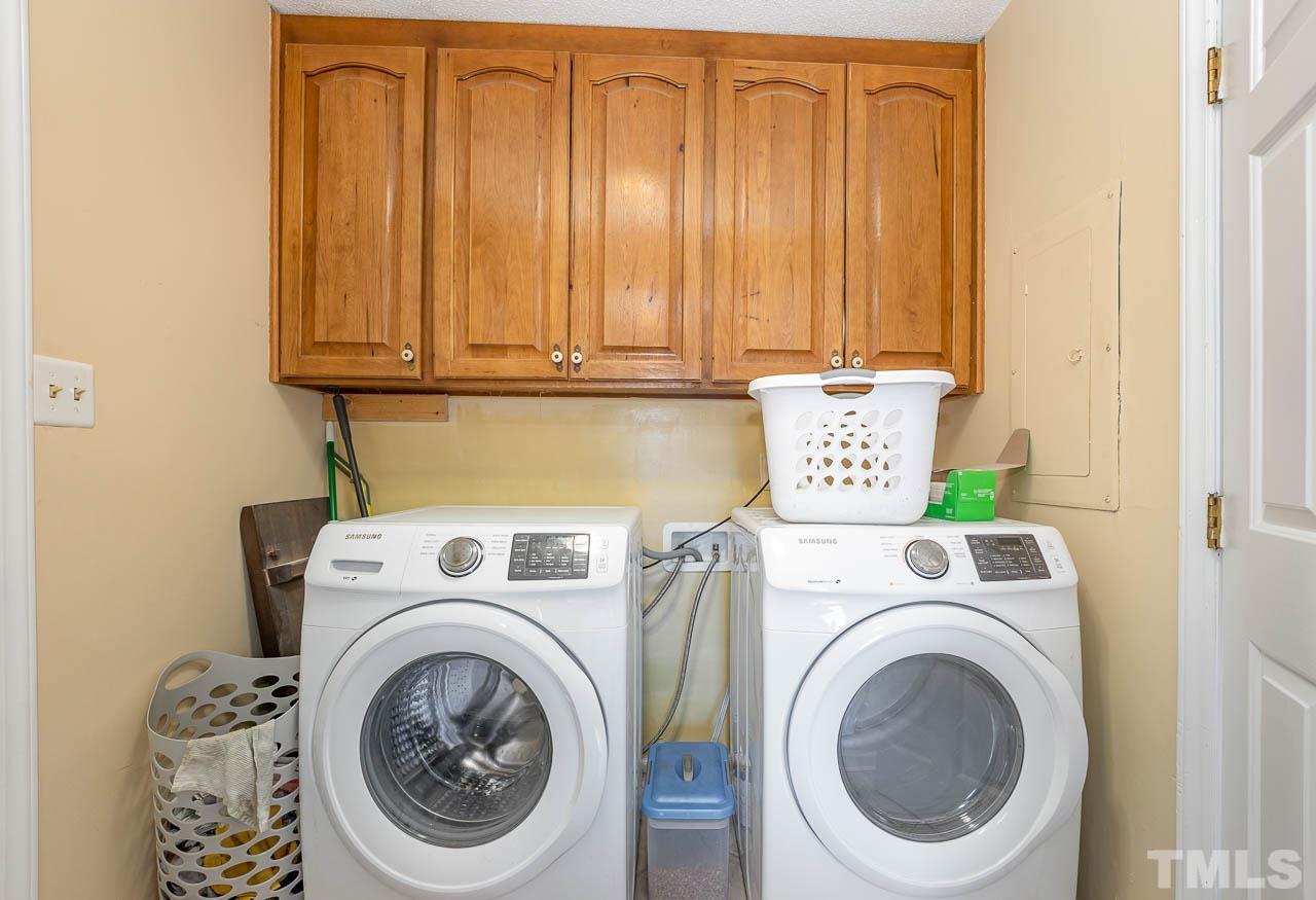 2009 Ryerson Drive Garner, NC 27529 - Photo 18 of 27 a utility room with dryer and washer