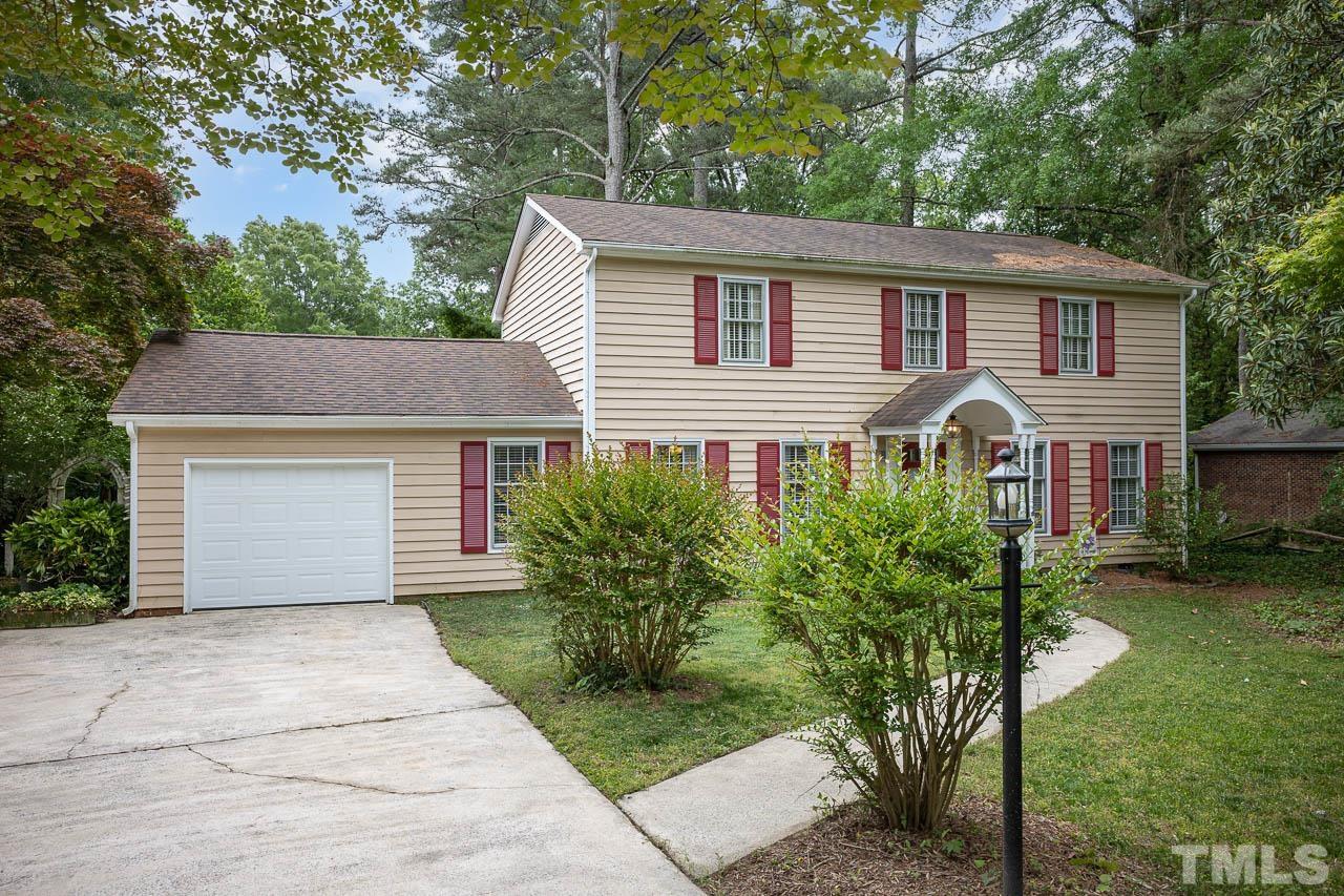 2009 Ryerson Drive Garner, NC 27529 - Photo 2 of 27 a front view of a house with a garden and plants