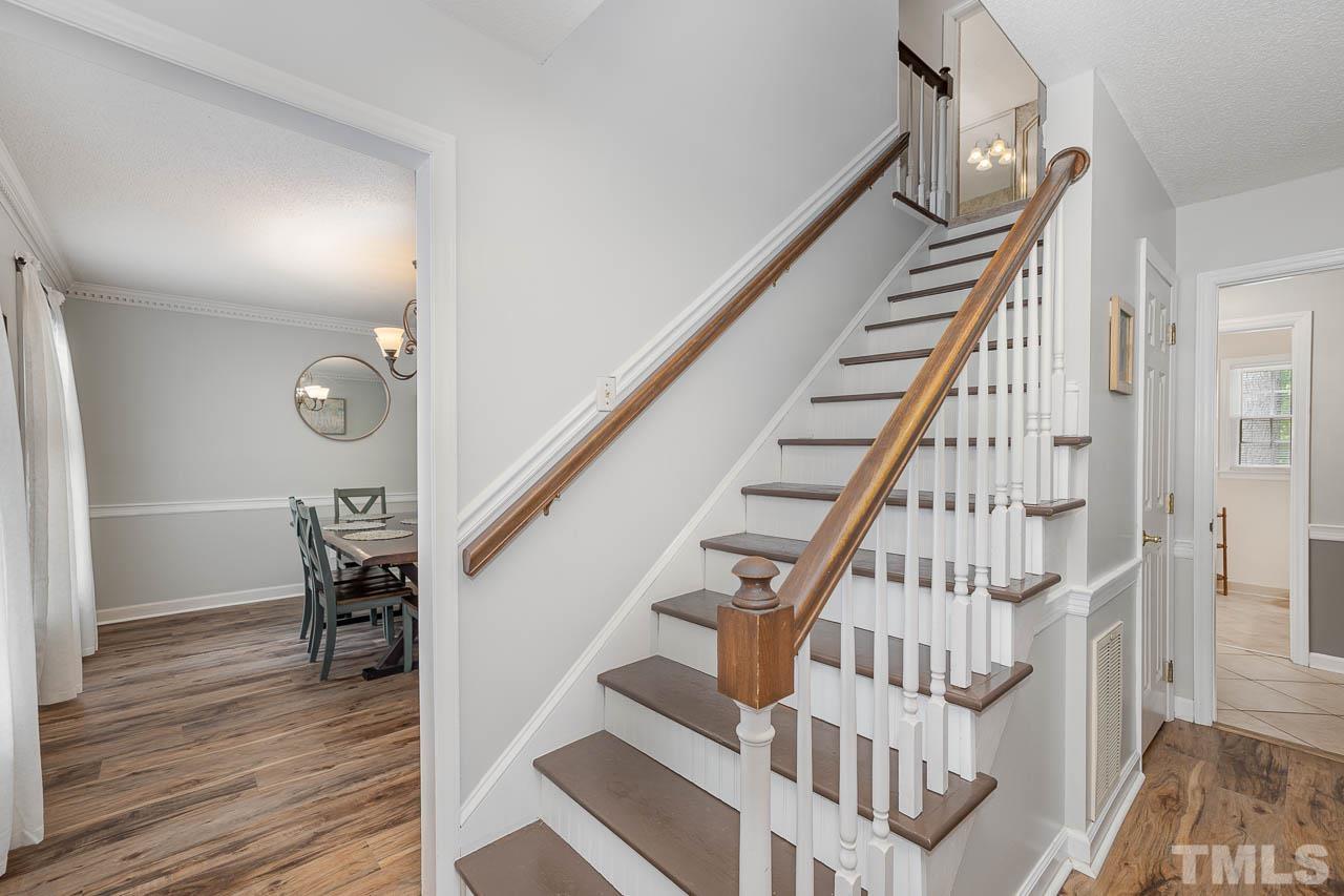 2009 Ryerson Drive Garner, NC 27529 - Photo 8 of 27 a view of entryway with wooden floor