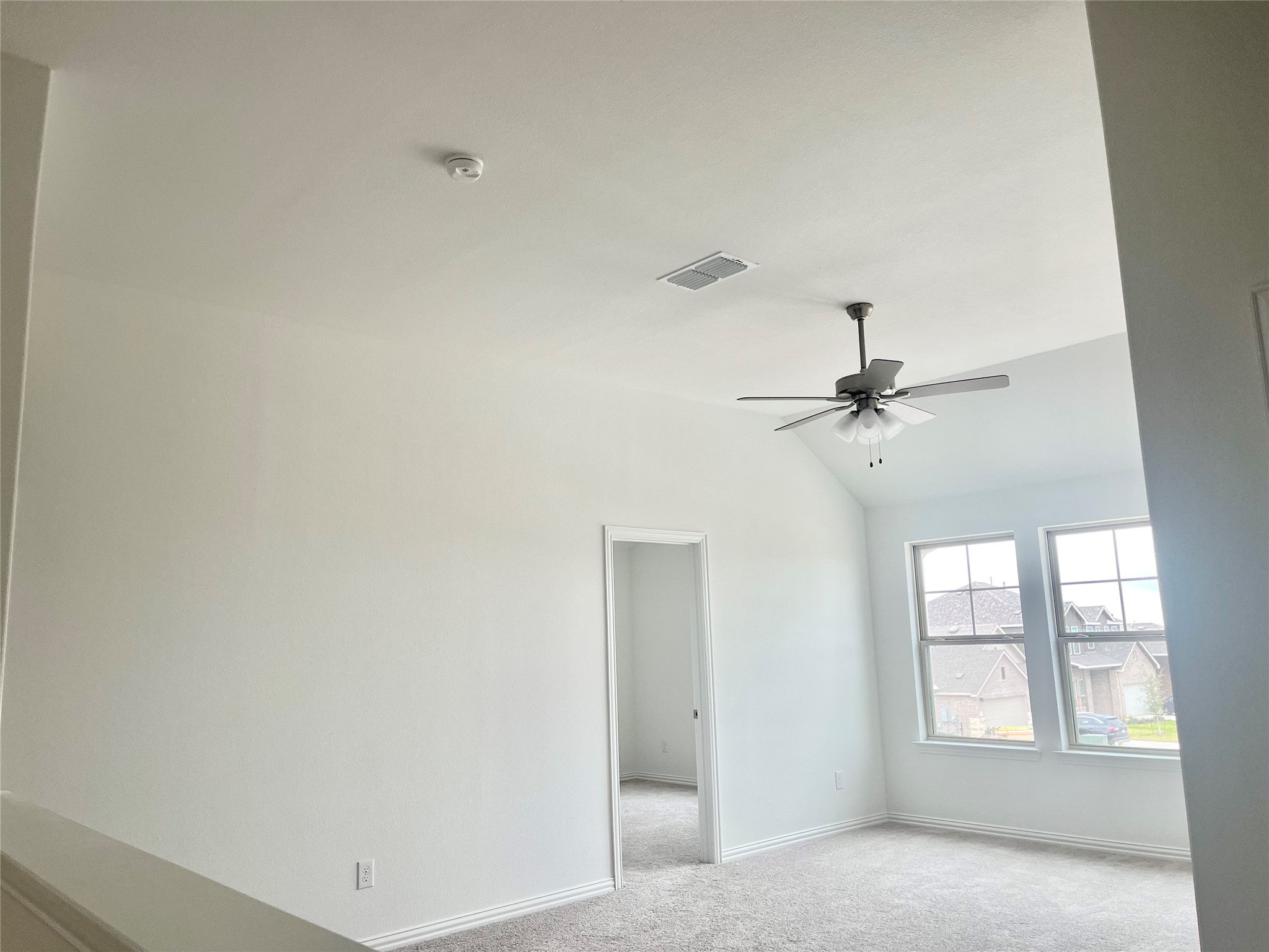 25620 Wheat Seed Lane Elgin, TX 78621 - Photo 11 of 14 a view of an empty room with a window