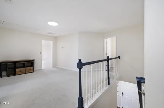 a view of a livingroom with a hallway