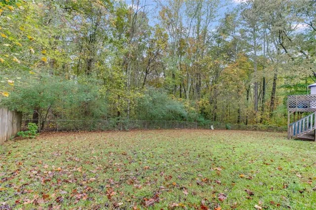 a view of a yard with a trees