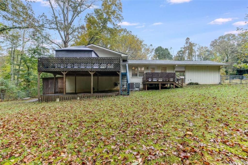 104 Eaves Road Bremen, GA 30110 - Photo 23 of 29 front view of a house with a yard
