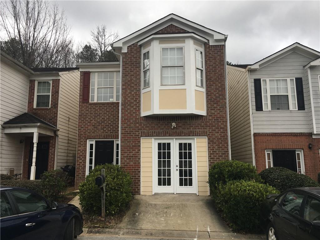 2813 Godby Road College Park, GA 30349 - Photo 1 of 1 a front view of a house with garden