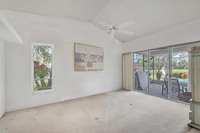 a view of a livingroom with furniture window and outside view