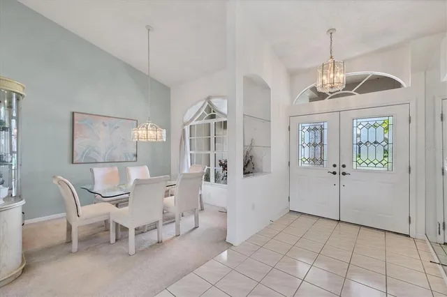 a view of a livingroom with furniture and windows