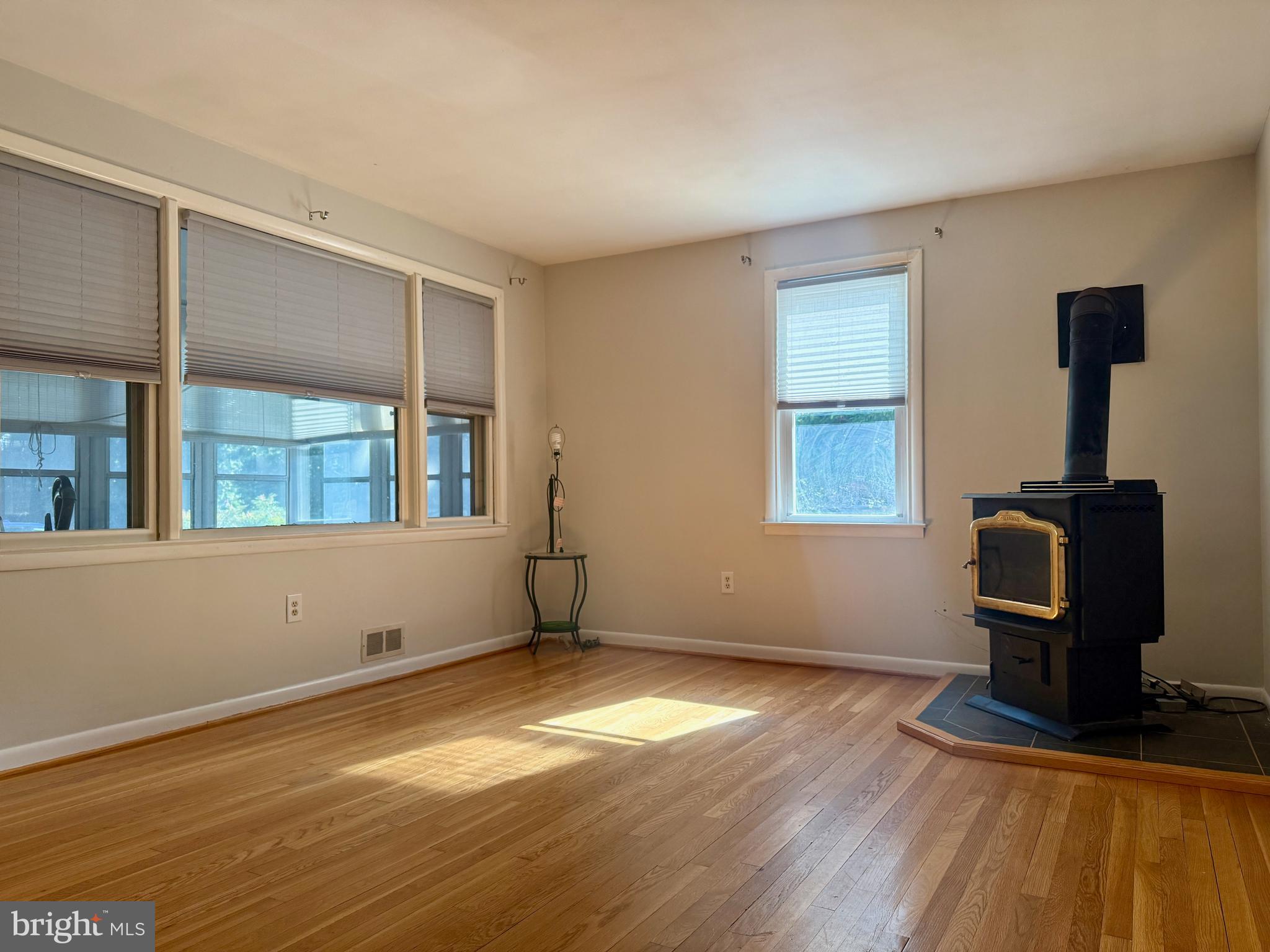 3817 Schroeder Avenue Perry Hall, MD 21128 - Photo 20 of 48 a view of empty room with wooden floor and fan