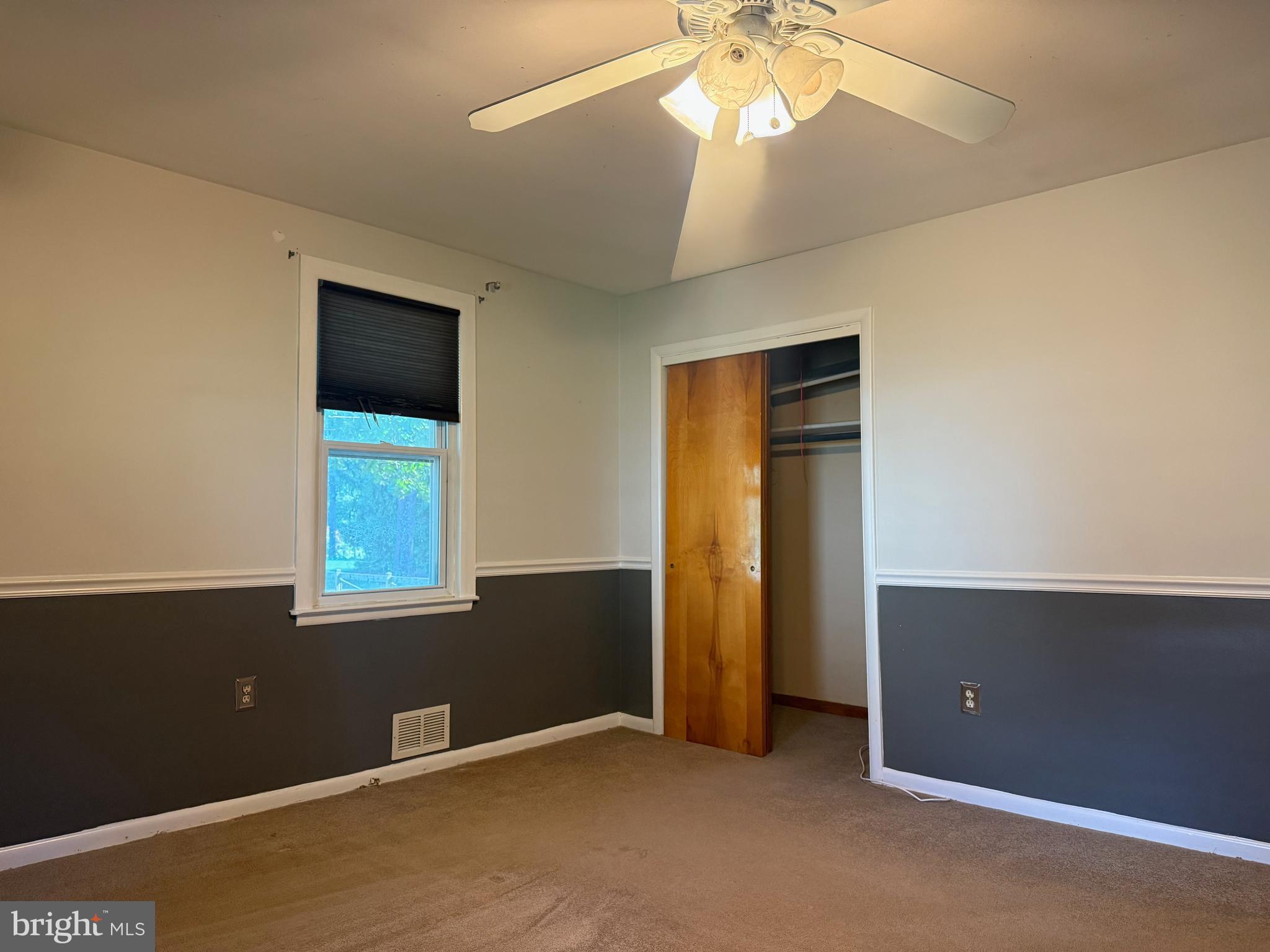 3817 Schroeder Avenue Perry Hall, MD 21128 - Photo 24 of 48 a view of an empty room with window and chandelier fan