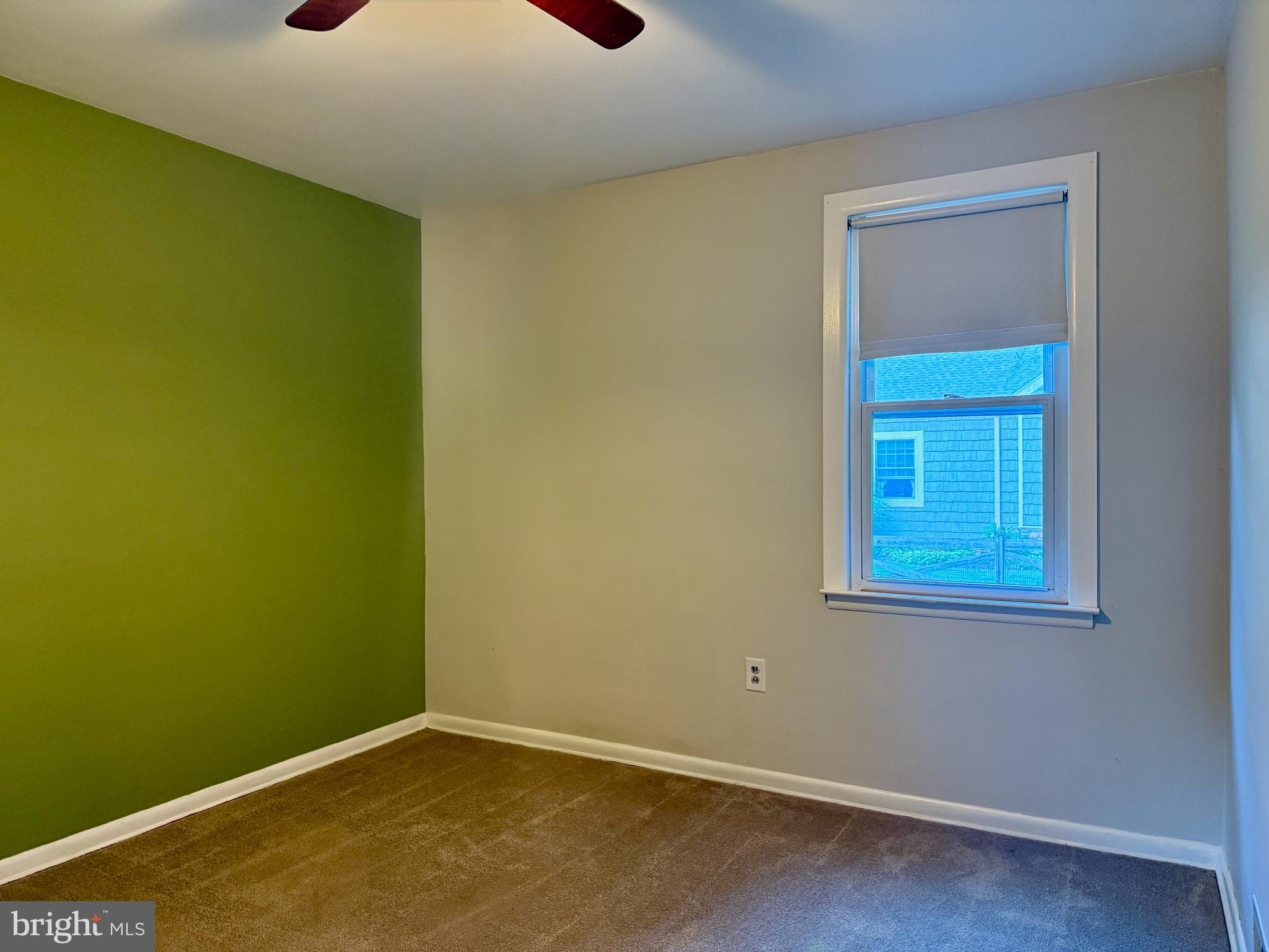 3817 Schroeder Avenue Perry Hall, MD 21128 - Photo 26 of 48 a view of a small space with wooden floor and a window