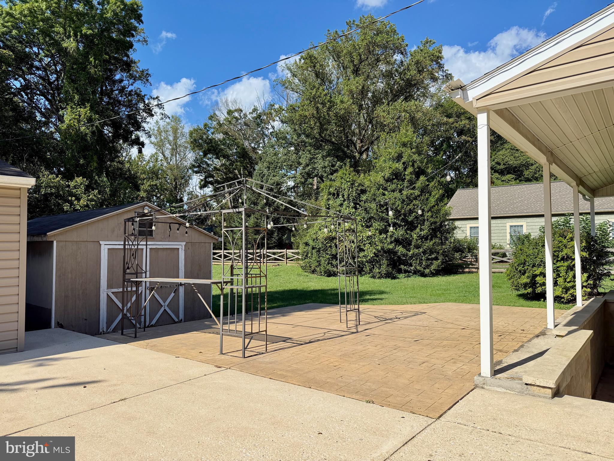3817 Schroeder Avenue Perry Hall, MD 21128 - Photo 8 of 48 a view of a house with a backyard and a patio