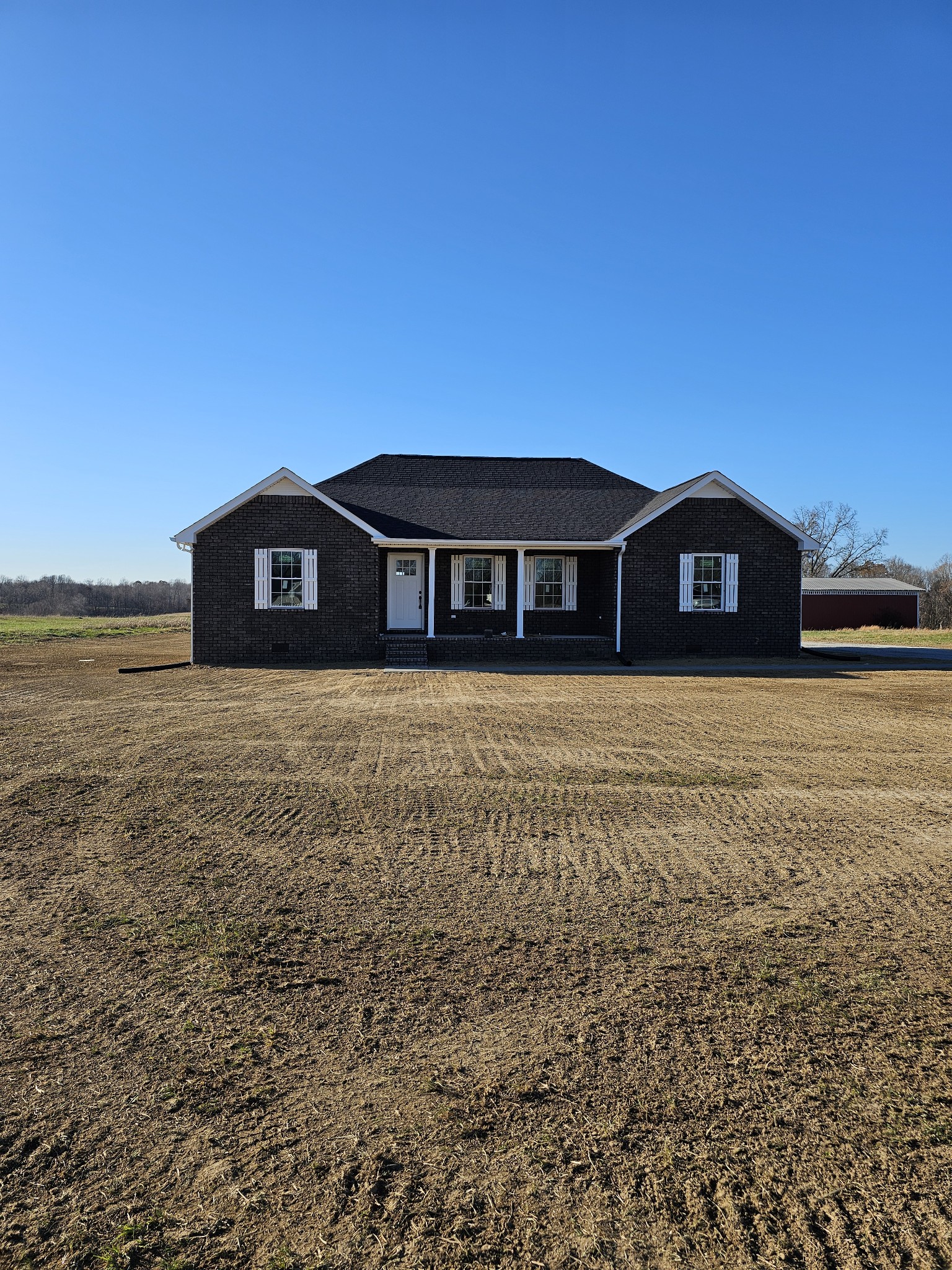 5209 Galen Road Lafayette, TN 37083 - Photo 1 of 24 a view of a big room with an ocean view
