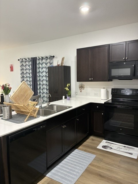 233 Perfect World Loop Jarrell, TX 76537 - Photo 5 of 24 A well-appointed kitchen showcasing contemporary appliances and ample counter space.