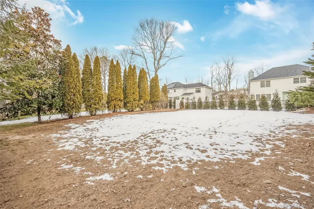 a view of snow on the road