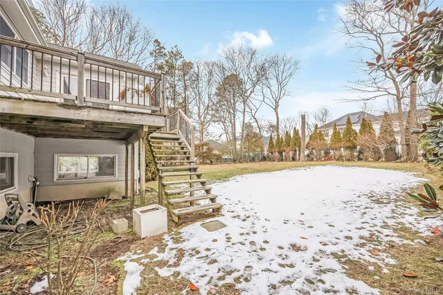 a view of a road with a house in the background