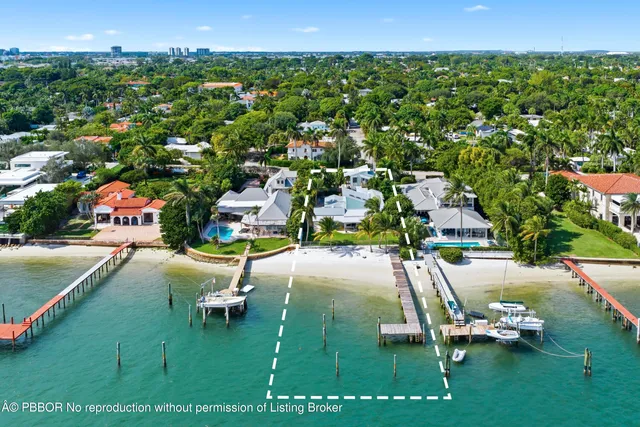 a view of kitchen and sink with living room