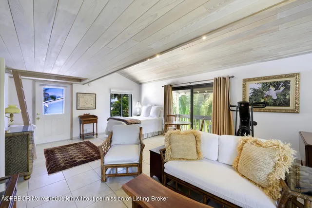 a kitchen with a stove and white cabinets
