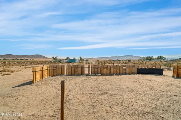 a bed room with a bed and a view of beach
