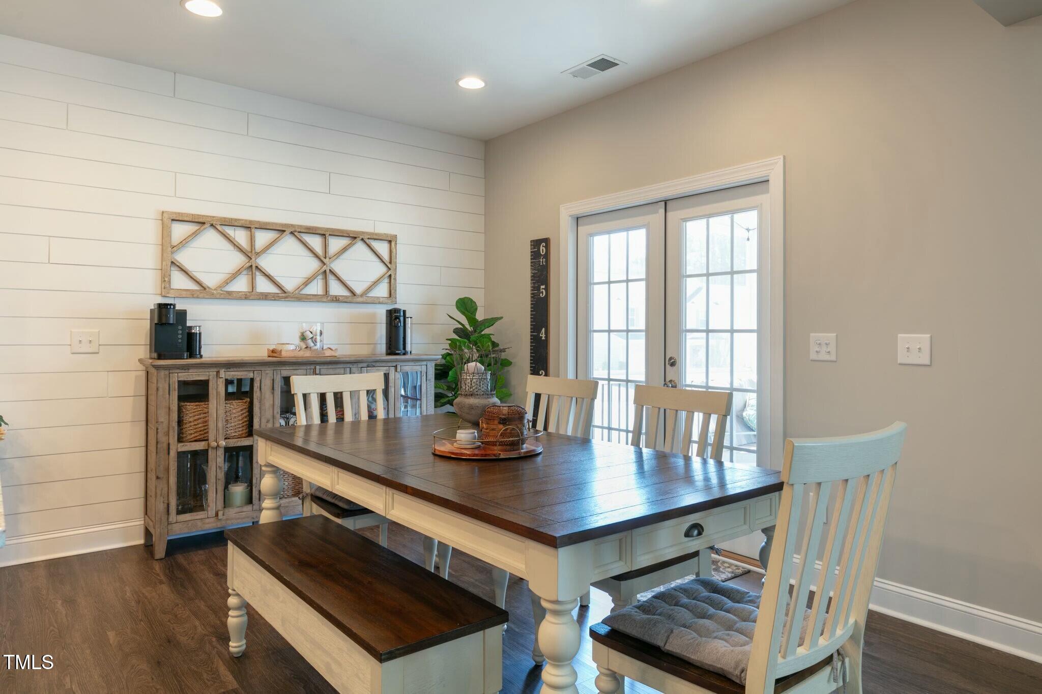 3508 Longleaf Estates Drive Raleigh, NC 27616 - Photo 14 of 45 a view of a dining room with furniture and wooden floor
